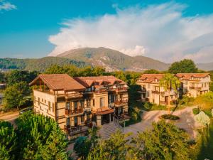 an aerial view of a house with a mountain in the background at Enso Inn in Fethiye