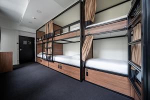 a group of bunk beds in a room at Beau M Paris in Paris