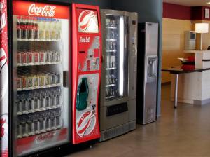 a coca cola vending machine in a store at Holiday Inn Express Madrid-Getafe by IHG in Getafe