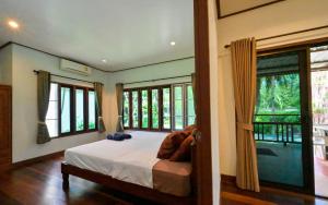 Krevet ili kreveti u jedinici u okviru objekta Poowadee resort