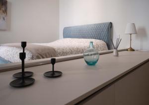 A bed or beds in a room at Home Venice Apartments - Rialto 4