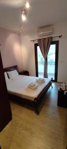 A bed or beds in a room at Oasi