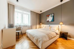 Ένα ή περισσότερα κρεβάτια σε δωμάτιο στο Apartament Nowolipki z sypialnią