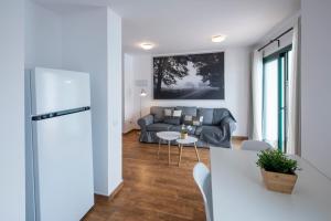 A seating area at Apartamentos Los Rosales