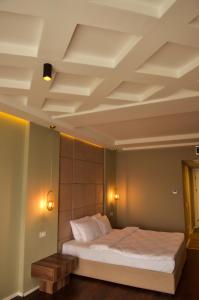 Hotel Cami客房内的一张或多张床位