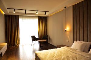 Hotel Cami客房内的一张或多张床位