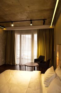 Hotel Cami客房内的一张或多张床位