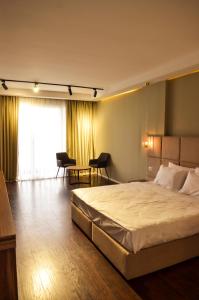 Hotel Cami客房内的一张或多张床位