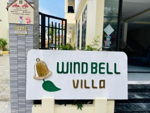 una señal que dice villa de campana de viento en Windbell Villa Hoi An en Hoi An