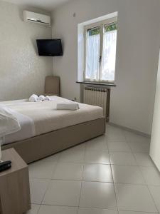 Letto o letti in una camera di Enjoy Home Sorrento