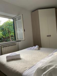 Letto o letti in una camera di Enjoy Home Sorrento