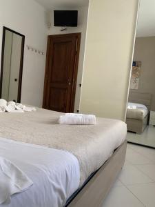 Letto o letti in una camera di Enjoy Home Sorrento