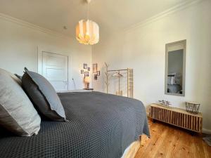 Кровать или кровати в номере Apartment Meeresbrise mit Balkon