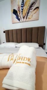 Postel nebo postele na pokoji v ubytování Hotel de Ksamil