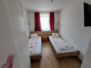 Posteľ alebo postele v izbe v ubytovaní Appartement Haus Gatterer