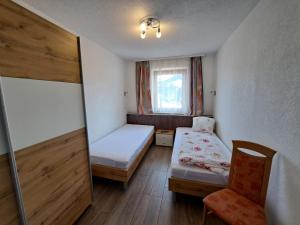 Posteľ alebo postele v izbe v ubytovaní Appartement Haus Gatterer