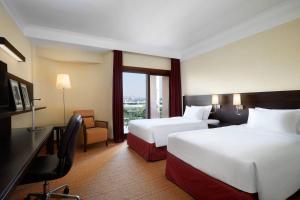 Postel nebo postele na pokoji v ubytování Courtyard by Marriott Rome Central Park