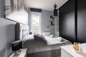 Fotografia z galérie ubytovania Kierbedzia 6 - Bezpłatny podziemny parking - free parking - Piękny ogródek z tarasem - 2km Łazienki Królewskie - WiFi - Smart TV 50 cali - Good Apartments vo Varšave