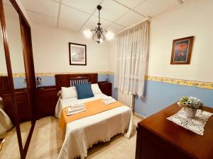 Łóżko lub łóżka w pokoju w obiekcie Villa Playa Portomayor BUEU
