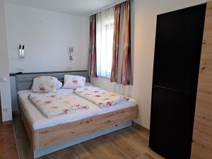 Posteľ alebo postele v izbe v ubytovaní Appartement Haus Gatterer