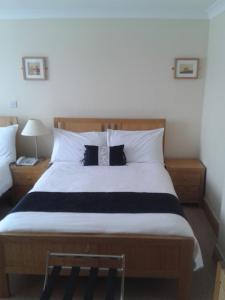 Voodi või voodid majutusasutuse Percy French Hotel toas