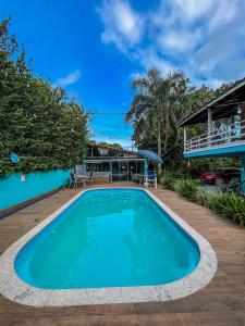 Πισίνα στο ή κοντά στο Pousada Orquídeas do Guarujá