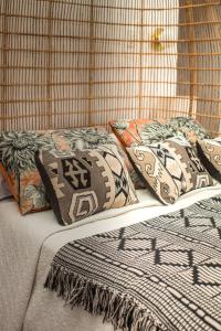Кровать или кровати в номере Villa Kulintang