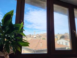 Fotografie z fotogalerie ubytování Palazzetto del Pittore v destinaci San Quirico dʼOrcia
