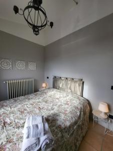 Postel nebo postele na pokoji v ubytování Palazzetto del Pittore