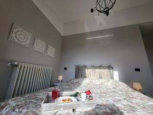 Postel nebo postele na pokoji v ubytování Palazzetto del Pittore