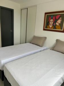Кровать или кровати в номере Apartamento Intermares
