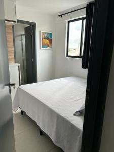 Cama ou camas em um quarto em Apartamento Intermares