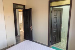Postel nebo postele na pokoji v ubytování Gracieus Residences