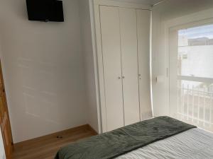 Łóżko lub łóżka w pokoju w obiekcie Bonefish 2 Apartment