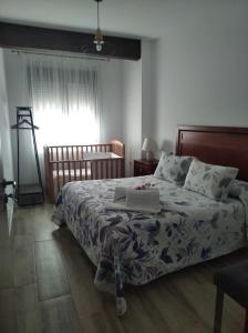 En eller flere senge i et værelse på La Teja del Jerte