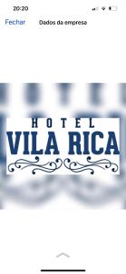 Un cartel que lee para obtener arroz Villa en Hotel Vila Rica en Maringá