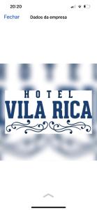 a sign that reads to get villa rice at Hotel Vila Rica in Maringá