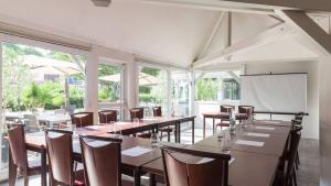 Restaurace v ubytování The Originals City, Hôtel Le Louisiane, Belfort Sud