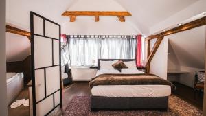 Postel nebo postele na pokoji v ubytování Hotel Guesthouse Dalnig