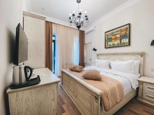 Postel nebo postele na pokoji v ubytování Aspar Boutique Hotel
