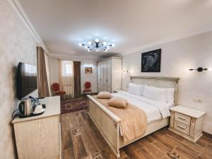 Postel nebo postele na pokoji v ubytování Aspar Boutique Hotel