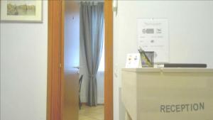 ローマにあるMaria's Roomsの二枚の写真