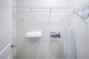 a bathroom with a towel rack and a shower curtain at Modern Comforts and Spacious Living 4B/3.5 Bath in Pickering +35 photos