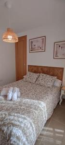 Postel nebo postele na pokoji v ubytování El Zarzal de Segura