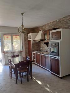 Kuchyň nebo kuchyňský kout v ubytování Villa Bersani