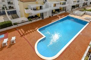 an overhead view of a swimming pool on a building at Penthouse Cassia in Cabanas de Tavira
