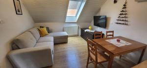 Posezení v ubytování Apartments & Hostel Bohinj