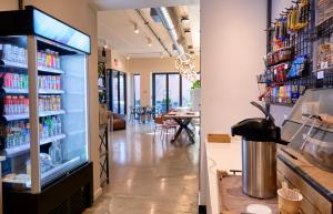 a grocery store with a large display case of drinks at The Maj Hotel in Philadelphia