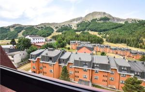 arial view of a town with houses and mountains at 2 Bedroom Cozy Apartment In San Massimo in San Massimo