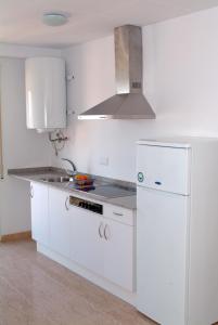 Kuchyňa alebo kuchynka v ubytovaní Aparthotel Iris